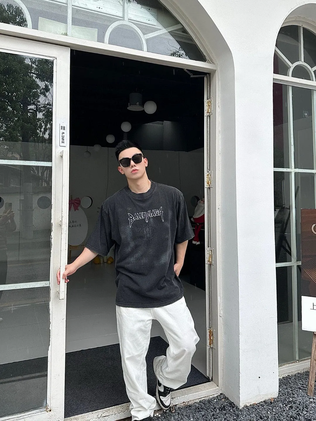 Balenciaga Distressed Logo T-Shirt in Black